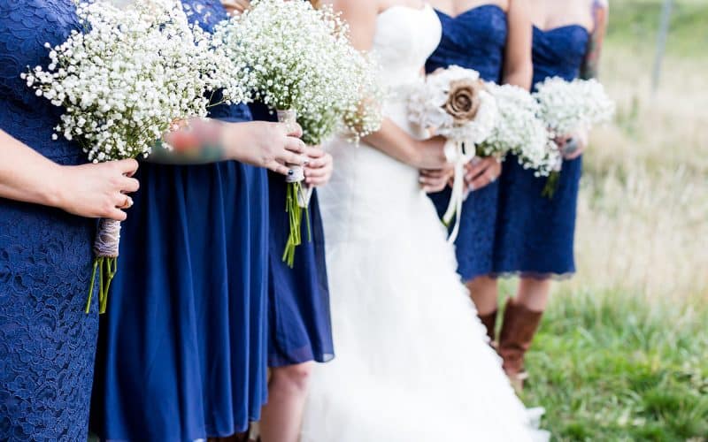 Small outdoor wedding in white and blue theme.